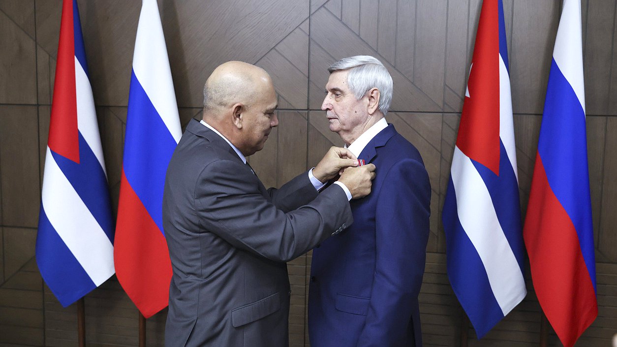 Politburo member, Secretary of the Central Committee of the Communist Party for Organizational Affairs, and member of the National Assembly of People's Power of the Republic of Cuba Roberto Tomás Morales Ojeda and First Deputy Chairman of the State Duma Ivan Melnkikov