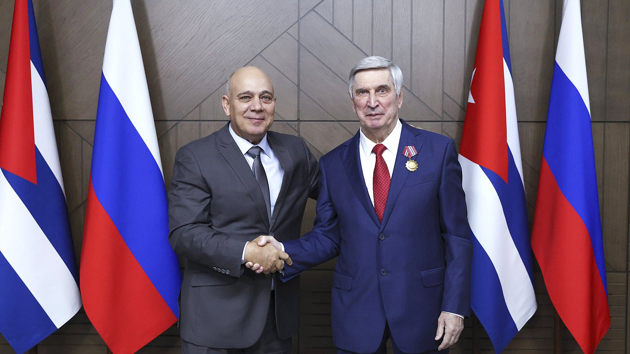 Politburo member, Secretary of the Central Committee of the Communist Party for Organizational Affairs, and member of the National Assembly of People's Power of the Republic of Cuba Roberto Tomás Morales Ojeda and First Deputy Chairman of the State Duma Ivan Melnikov