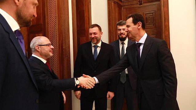 Chairman of the Committee on Issues of Public Associations and Religious Organizations Sergei Gavrilov and President of Syria Bashar Al-Assad